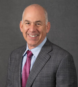Neal Buchalter, President of Parker Laboratories, professional headshot. Leader in ultrasound gel, disinfectants, and medical device innovation.